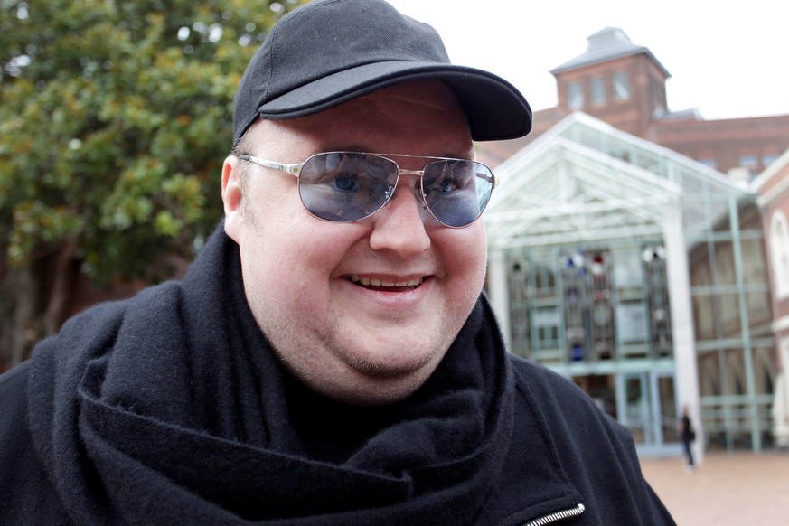 FILE PHOTO: Megaupload founder Kim Dotcom talks to members of the media as he leaves the High Court in Auckland February 29, 2012. REUTERS/Simon Watts/File Photo