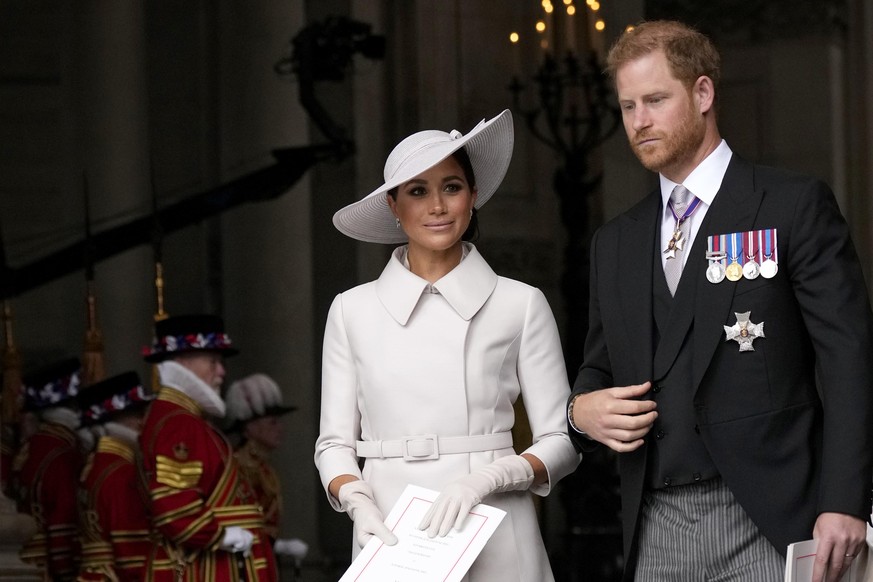 Prince Harry and Meghan Markle, Duke and Duchess of Sussex leave after a service of thanksgiving for the reign of Queen Elizabeth II at St Paul&#039;s Cathedral in London, Friday, June 3, 2022 on the  ...