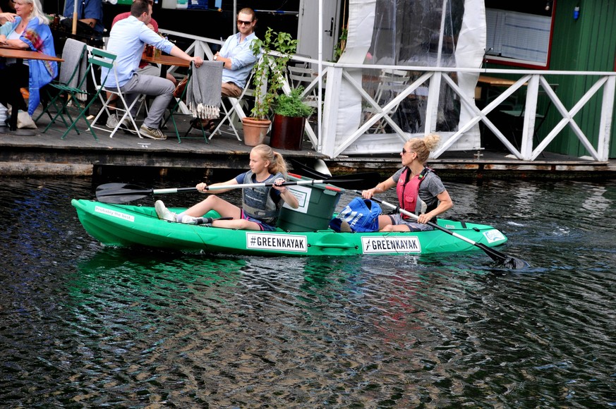 Erfolgreiche Paddeltour in nachhaltiger Mission mit einem der Kajaks von Green Kayak.