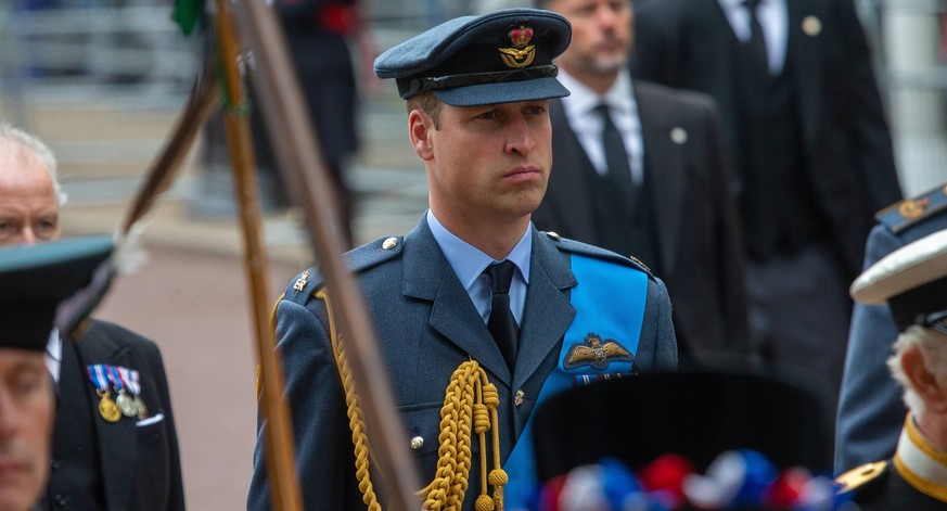 September 19, 2022, London, England, United Kingdom: Prince of WALES WILLIAM is seen following the coffin of Queen Elizabeth II, dripped with royal standard on Horse Guards Road during the funeral pro ...