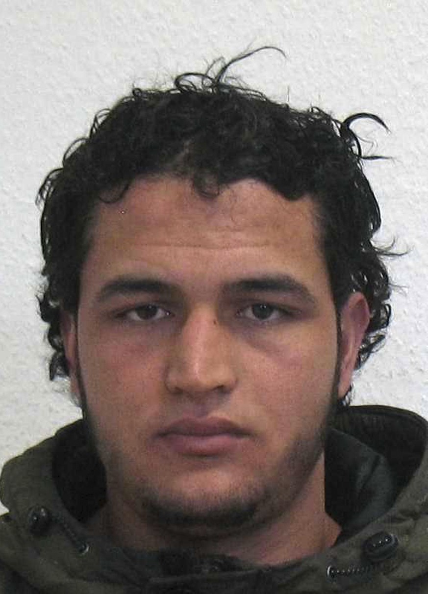 FILE - In this file photo, issued by German federal police on Wednesday, Dec. 21, 2016, 24-year-old Tunisian Anis Amri is shown, who was responsible for the fatal attack on the Christmas market in Ber ...