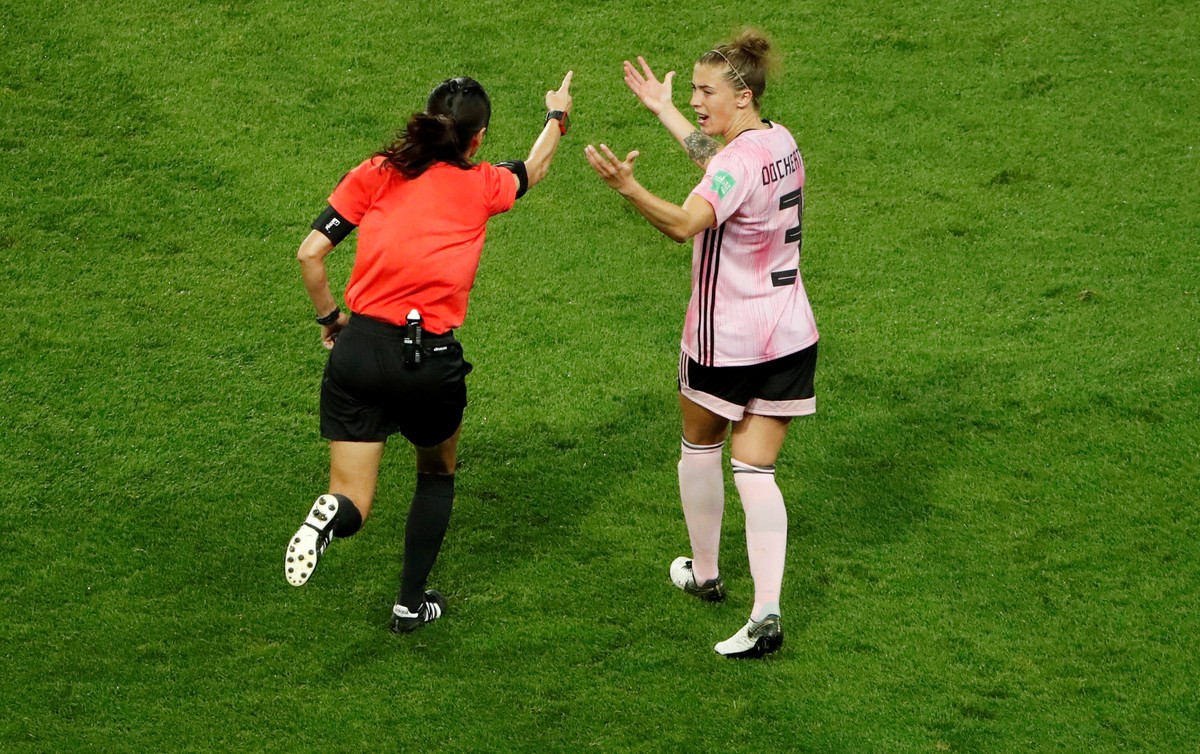 FILE PHOTO: Soccer Football - Women's World Cup - Group D - Scotland v Argentina - Parc des Princes, Paris, France - June 19, 2019 Referee Ri Hyang-ok signals a penalty after a VAR review as Scot ...