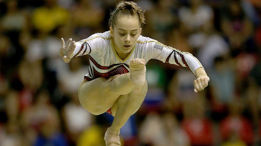 RIO DE JANEIRO, BRAZIL - APRIL 17: Axelle Klinckaert of Belgium competes on the balance beam during the Final Gymnastics Qualifier - Aquece Rio Test Event for the Rio 2016 Olympics at the Olympic Park ...