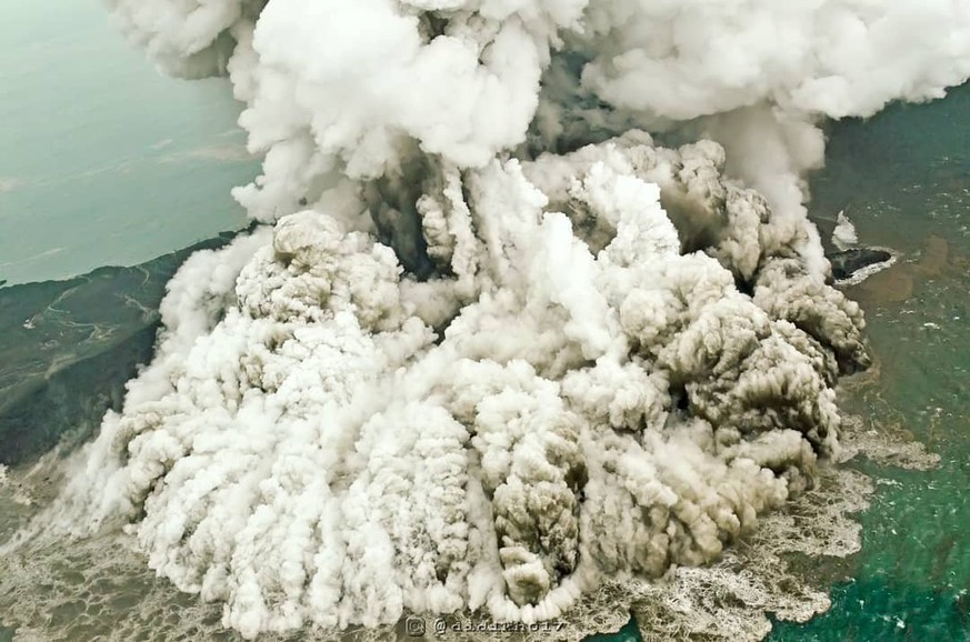 A plume of ash rises as Anak Krakatau erupts in Indonesia, December 23, 2018, in this picture obtained from social media. Susi Air/via REUTERS THIS IMAGE HAS BEEN SUPPLIED BY A THIRD PARTY. MANDATORY  ...