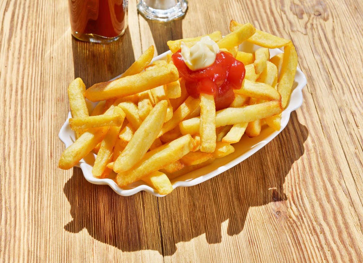 French Fries with Ketchup and Mayonnaise, French Fries with Ketchup and Mayonnaise on wooden Background