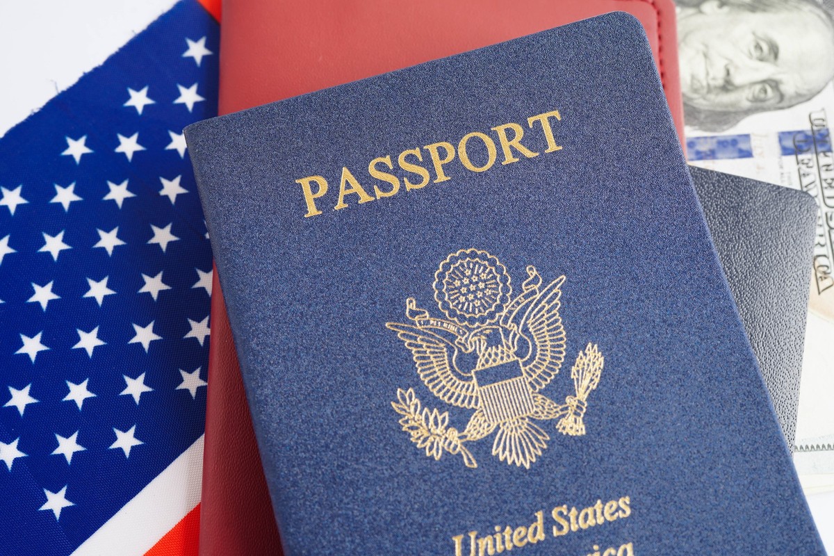 US passport issued to citizen and national of the United States, US passport issued to citizen and national of the United States of America to travel in most countries outside with USA flag and dollar ...
