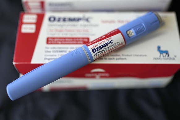 FILE - The injectable drug Ozempic is shown Saturday, July 1, 2023, in Houston. A preliminary review of side effects from popular drugs used to treat diabetes and obesity shows no link with suicidal t ...