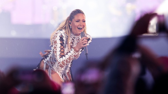 MUNICH, GERMANY - AUGUST 20: Helene Fischer performs live onstage at Messe Muenchen on August 20, 2022 in Munich, Germany. (Photo by Andreas Rentz/Getty Images)