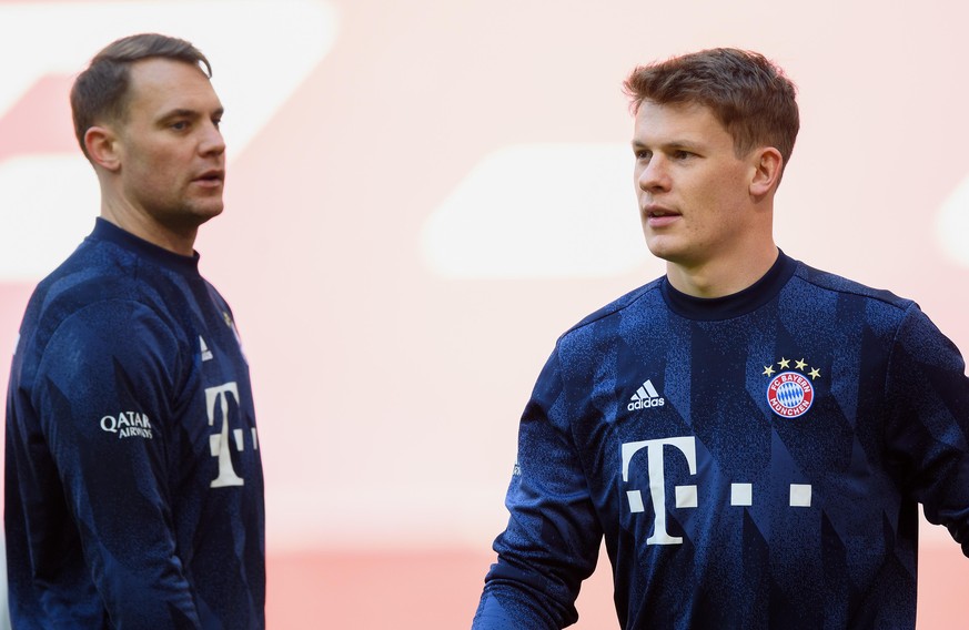 MUNICH, GERMANY - APRIL 10: Goalkeeper Manuel Neuer of FC Bayern München and Goalkeeper Alexander Nübel of FC Bayern München seen ahaed of the Bundesliga match between FC Bayern Muenchen and 1. FC Uni ...