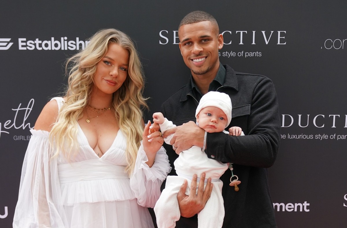 PARIS, FRANCE - MAY 11: Kevin Njie and Emely Hüffer with baby Ocean attend the .comTogether Girlbosses event by .comTessa on at La Plage Parisienne May 11, 2023 in Paris, France. (Photo by Thomas Nied ...