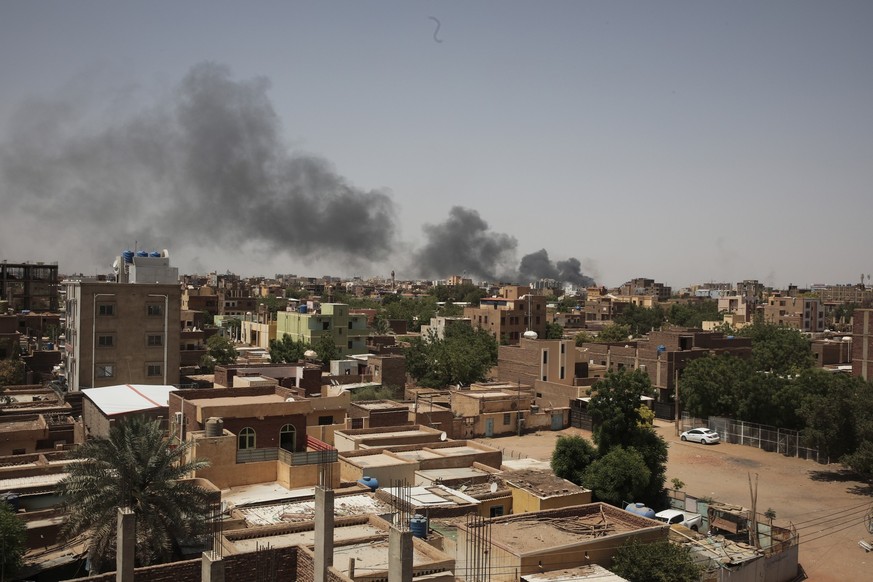 Smoke is seen in Khartoum, Sudan, Saturday, April 22, 2023. The fighting in the capital between the Sudanese Army and Rapid Support Forces resumed after an internationally brokered cease-fire failed.  ...