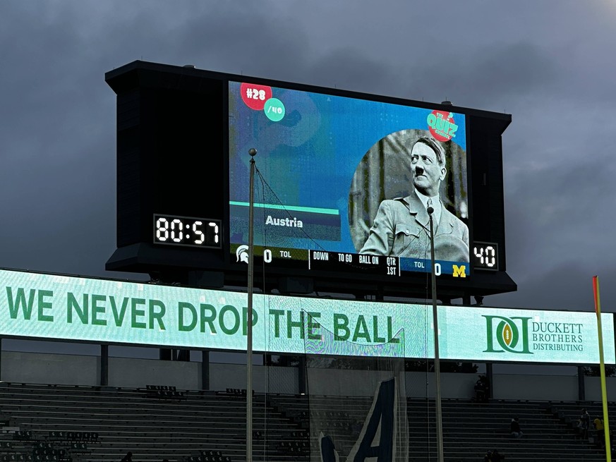 October 21, 2023, East Lansing, Michigan, U.S: ADOLF HITLER is displayed on the scoreboard at Michigan State University as part of a pregame trivia feature before Michigan State played the University  ...