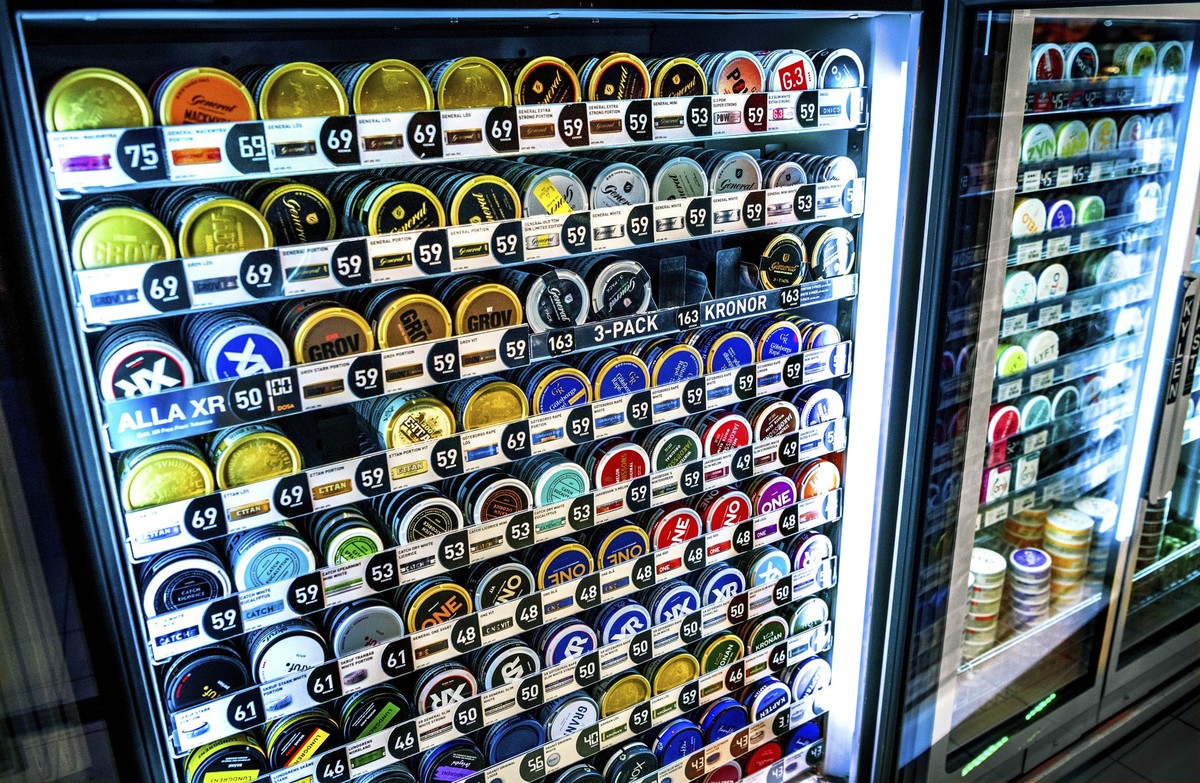 FILE - A view of a variety of boxes of snus (snuff) in a fridge, at a store in Stockholm on Jan. 23, 2023. Sweden, which has the lowest rate of smoking in Europe is now close to declaring itself “smok ...