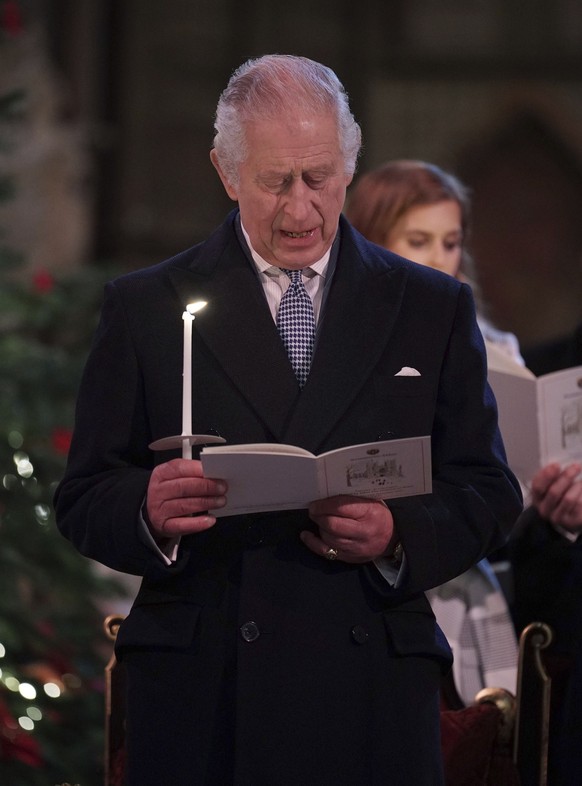Britain King Charles III during the &#039;Together at Christmas&#039; Carol Service at Westminster Abbey in London Saturday, Dec. 24, 2022. (Yui Mok/Pool via AP)