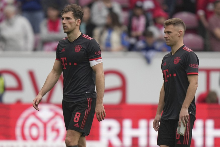 Bayern&#039;s Leon Goretzka and Joshua Kimmich leave the pitch after the German Bundesliga soccer match between 1. FSV Mainz 05 and FC Bayern Munich at the Mewa Arena in Mainz, Germany, Saturday, Apri ...