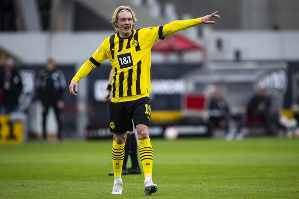 ARCHIVE - April 15, 2023, Baden-Wuerttemberg, Stuttgart: Football: Bundesliga, VfB Stuttgart - Borussia Dortmund, 28th matchday, Mercedes-Benz Arena.  Dortmund's Julian Brandt gestures.  The national player...