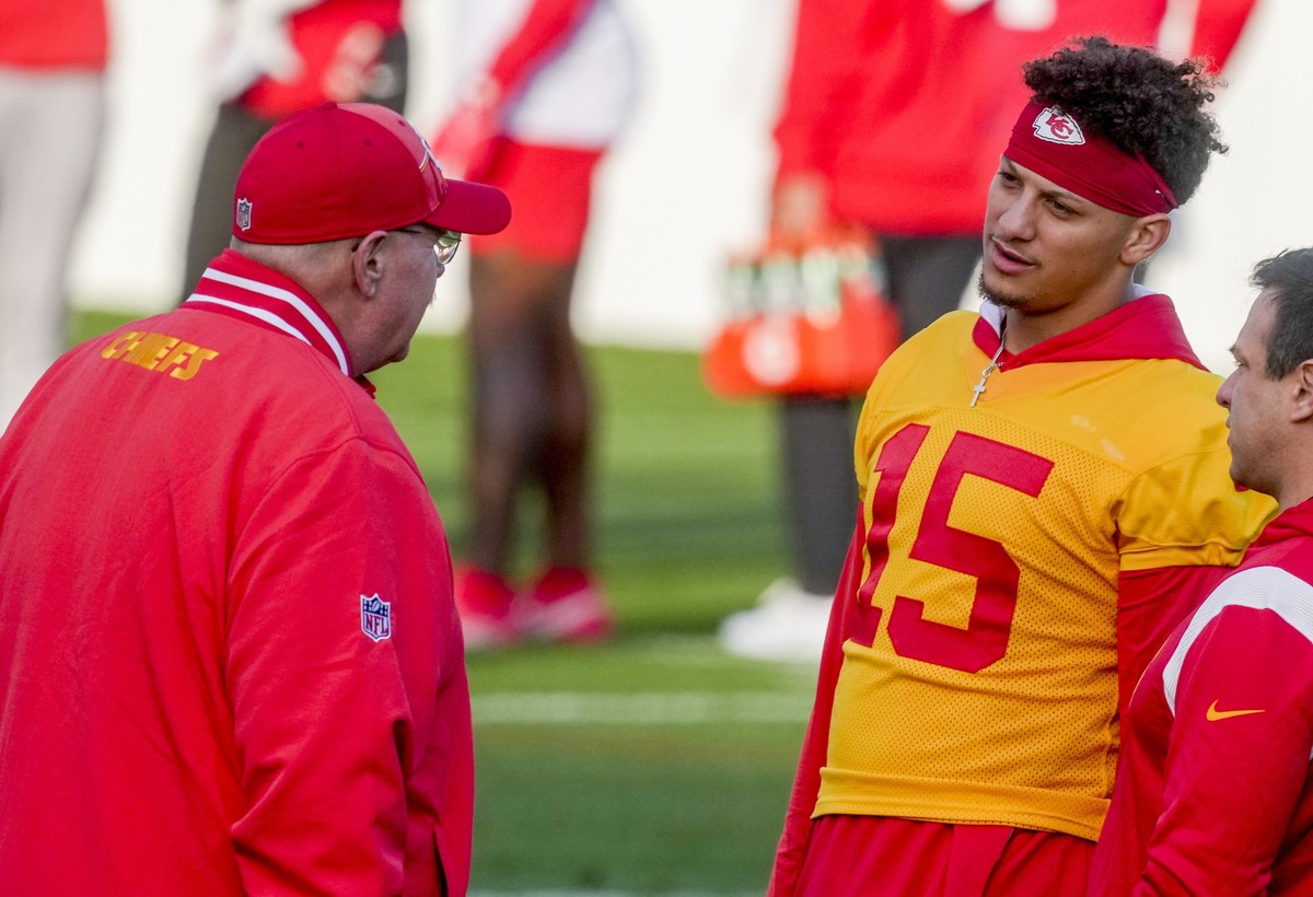 Kansas City Chiefs quarterback Patrick Mahomes (15), right, talks to Kansas City Chiefs head coach Andy Reid during a practice session in Frankfurt, Germany, Friday, Nov. 3, 2023. The Kansas City Chie ...
