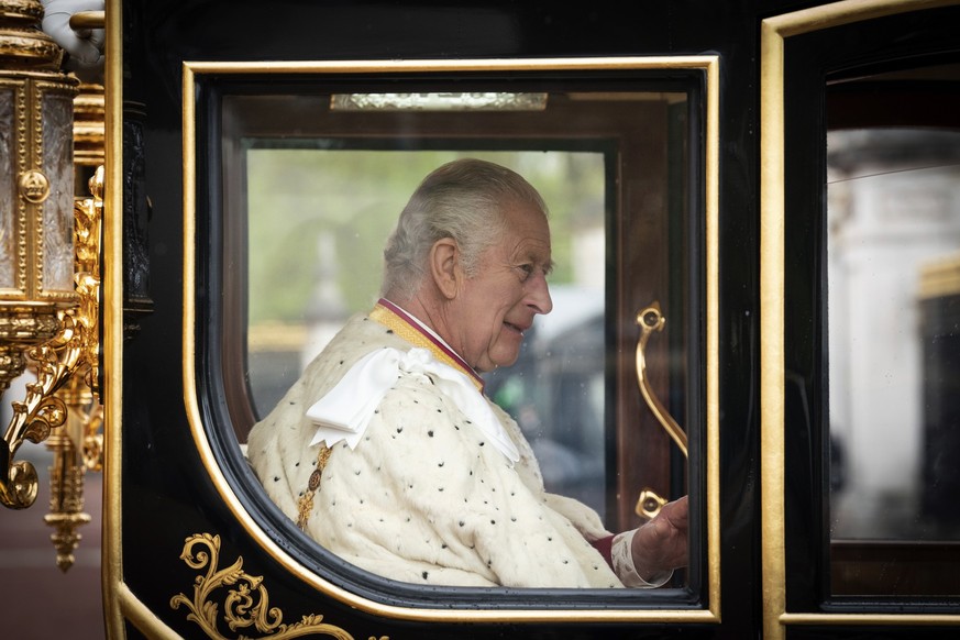 Britain&#039;s King Charles III and Camilla, Queen Consort travel in the Diamond Jubilee State Coach from Buckingham Palace to Westminster Abbey for the coronation ceremony in London Saturday, May 6,  ...