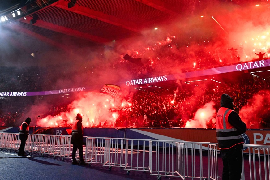 Fans of PSG let off flares during the Ligue 1 match between Paris Saint Germain and FC Nantes at Parc Des Princes on December 09, 2023 in Paris, France. Photo by federico pestellini / panoramic - FOOT ...