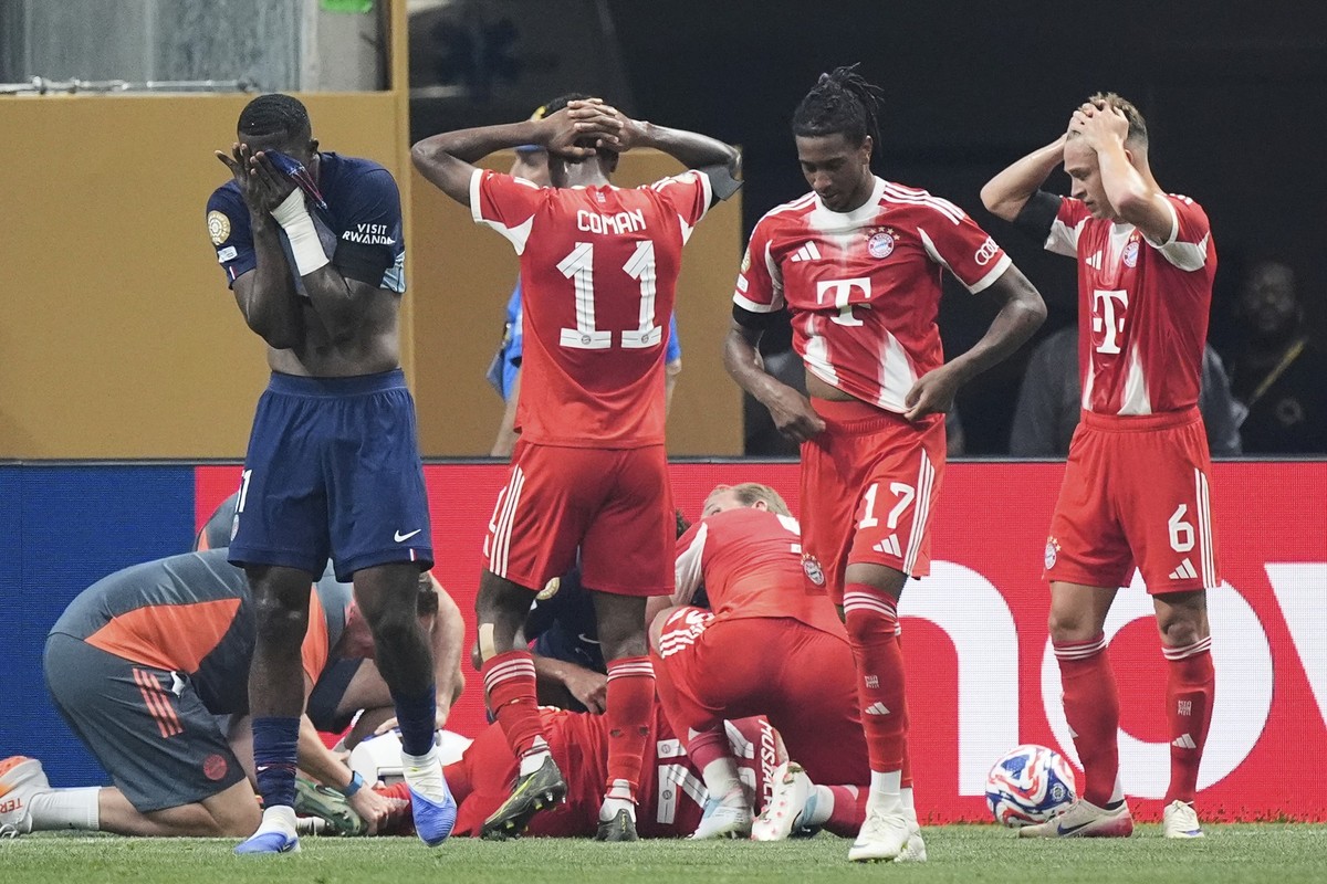 Bayern Munich&#039;s Jamal Musiala lies on the ground during the Club World Cup quarterfinal soccer match between PSG and Bayern Munich in Atlanta, Saturday, July 5, 2025. (AP Photo/Mike Stewart)