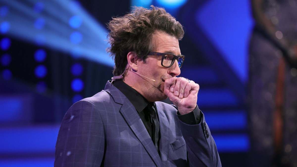 COLOGNE, GERMANY - MAY 14: Host Daniel Hartwich coughs during the 10th show of the 14th season of the television competition "Let's Dance" on May 14, 2021 in Cologne, Germany. (Photo by ...