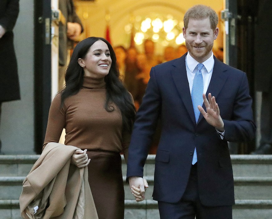 FILE - Prince Harry and Meghan, the Duke and Duchess of Sussex, leave after visiting Canada House on Jan. 7, 2020, in London. The second baby for the Duke and Duchess of Sussex is officially here: Meg ...