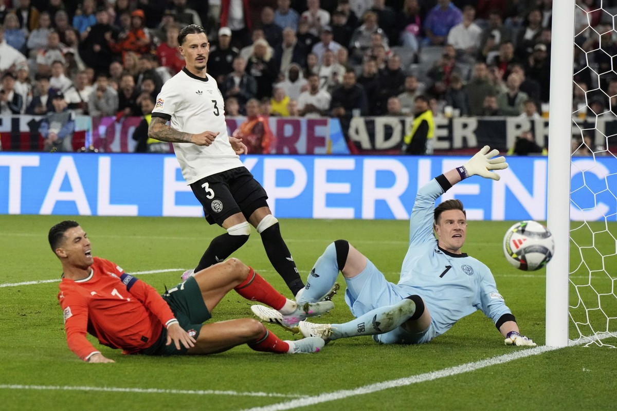 Portugal&#039;s Cristiano Ronaldo fails to score in front of Germany&#039;s goalkeeper Marc-Andre ter Stegen during the Nations League semifinal soccer match between Portugal and Germany at the Munich ...