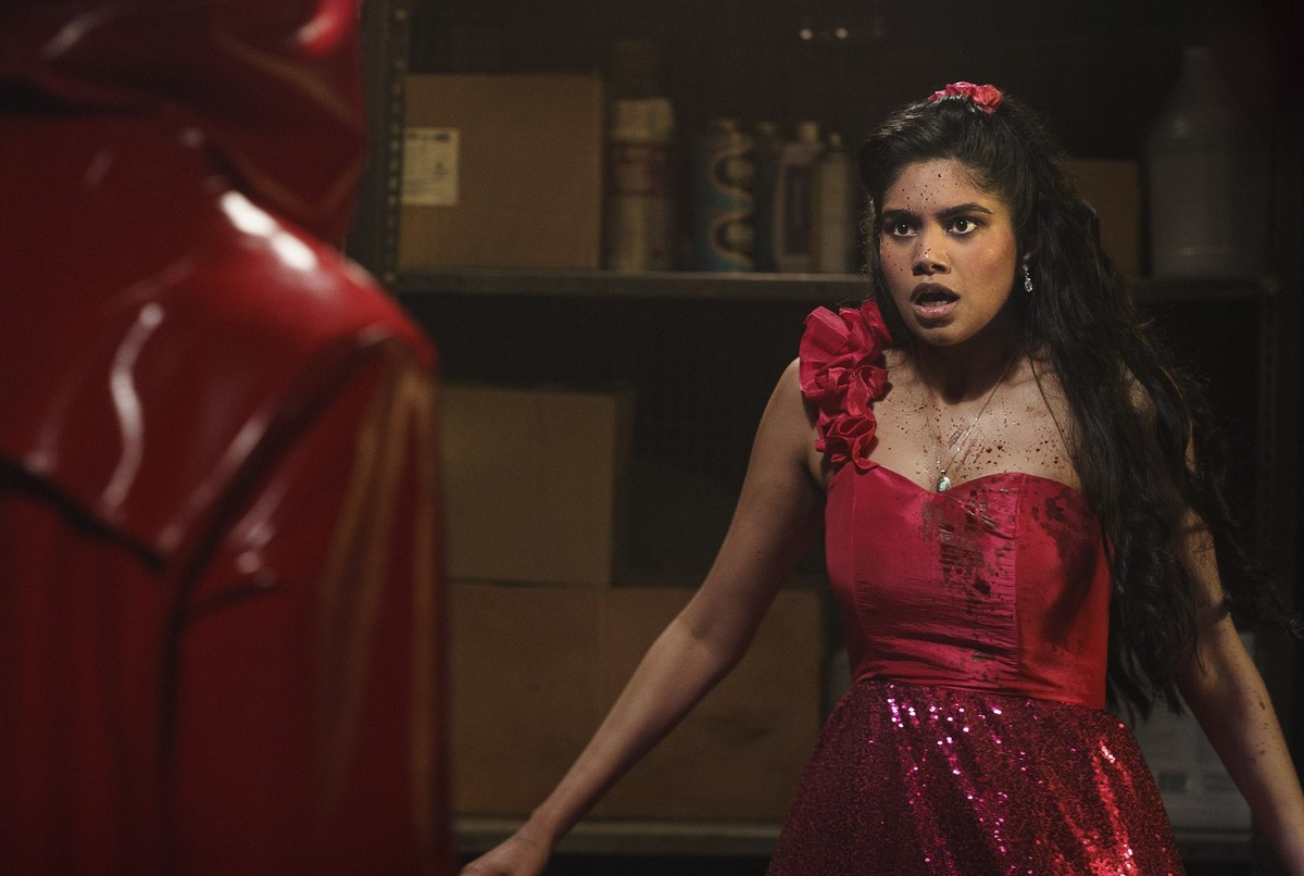 This image released by Netflix shows Rebecca Ablack, right, in a scene from "Fear Street: Prom Queen." (Sabrina Lantos/Netflix via AP)
