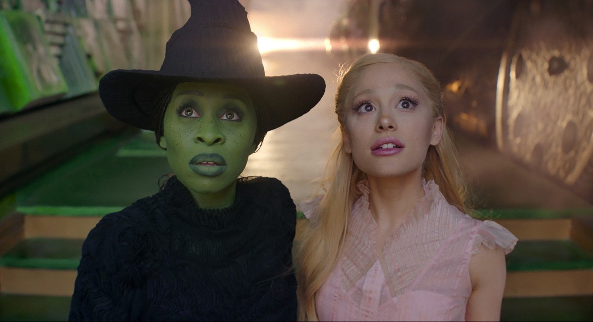 This image released by Universal Pictures shows Cynthia Erivo, left, and Ariana Grande in a scene from the film &quot;Wicked.&quot; (Universal Pictures via AP)