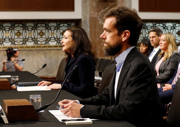 Twitter CEO Jack Dorsey and Facebook COO Sheryl Sandberg testify before a Senate Intelligence Committee hearing on foreign influence operations on social media platforms on Capitol Hill in Washington, ...