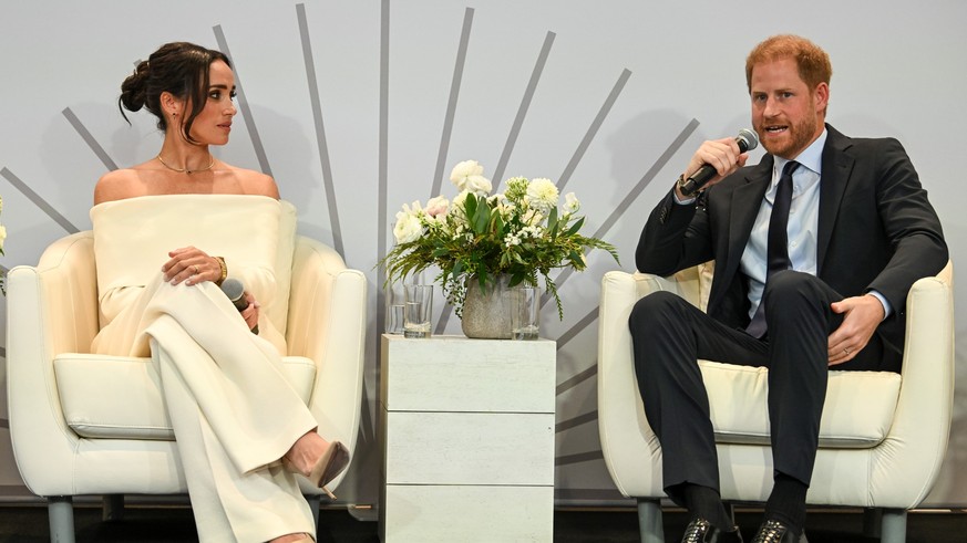 NEW YORK, NEW YORK - OCTOBER 10: (L-R) Meghan, Duchess of Sussex and Prince Harry, Duke of Sussex speak onstage at The Archewell Foundation Parents’ Summit: Mental Wellness in the Digital Age during P ...