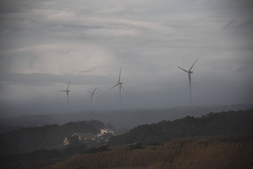 beautiful wind turbine in the morning mist Nazaré, Leiria District, Portugal CR_PJJZ231113C-1283903-01