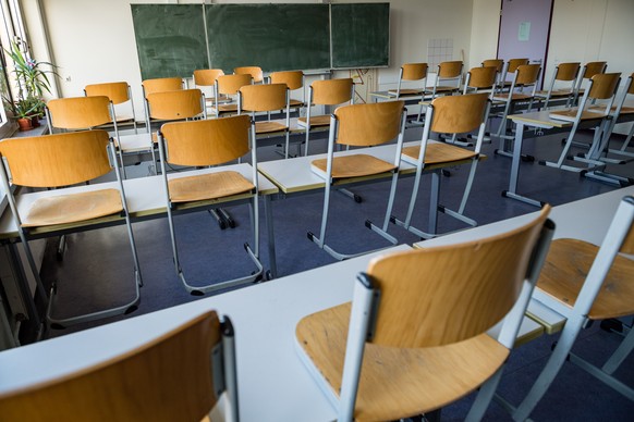 A picture taken on March 13, 2020 shows an empty classroom at a high school in Halle/Saale, eastern Germany, after it was closed to limit the spread of the novel coronavirus. - With Germany reporting ...