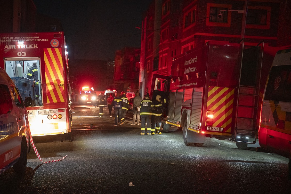 Fire fighters work on the scene of a deadly blaze that claimed the lives of dozens of people in downtown Johannesburg Thursday, Aug. 31, 2023. (AP Photo)