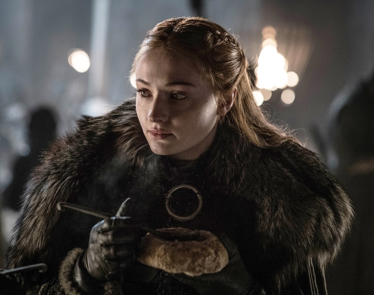 This image released by HBO shows Sophie Turner in a scene from "Game of Thrones," that aired Sunday, April 21, 2019. With the Game of Thrones' Jon Snow revealing his royal lineage to hi ...