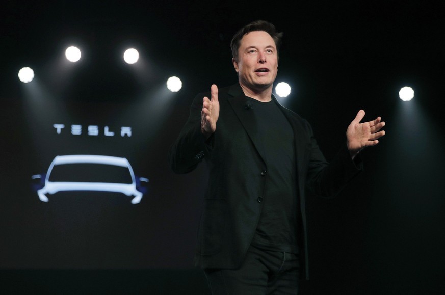 FILE- Tesla CEO Elon Musk speaks before unveiling the Model Y at Tesla&#039;s design studio March 14, 2019, in Hawthorne, Calif. A Florida judge ruled last week that a jury should decide whether Tesla ...