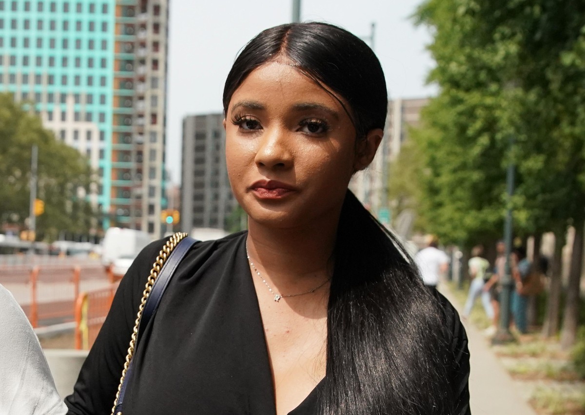 Supporter of R. Kelly Joycelyn Savage exits court after an arraignment for R&B singer R. Kelly on Friday, August 2, 2019 in New York City. R. Kelly was denied bail after pleading not guilty on rac ...