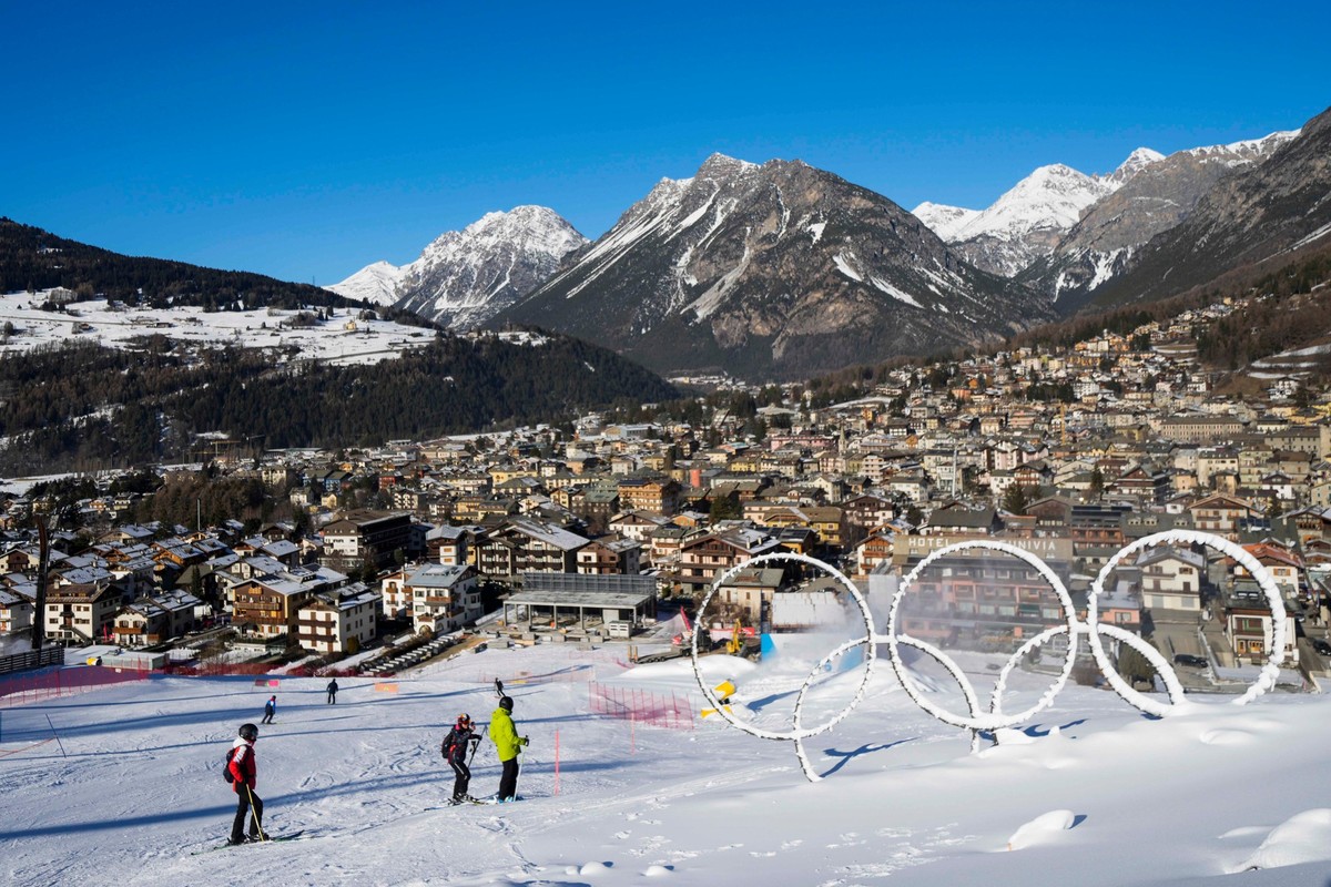FILE - Olympic rings are seen near a slope of the Stelvio Ski Center, venue for the alpine ski and ski mountaineering disciplines at the Milan Cortina 2026 Winter Olympics, in Bormio, Italy, Thursday, ...