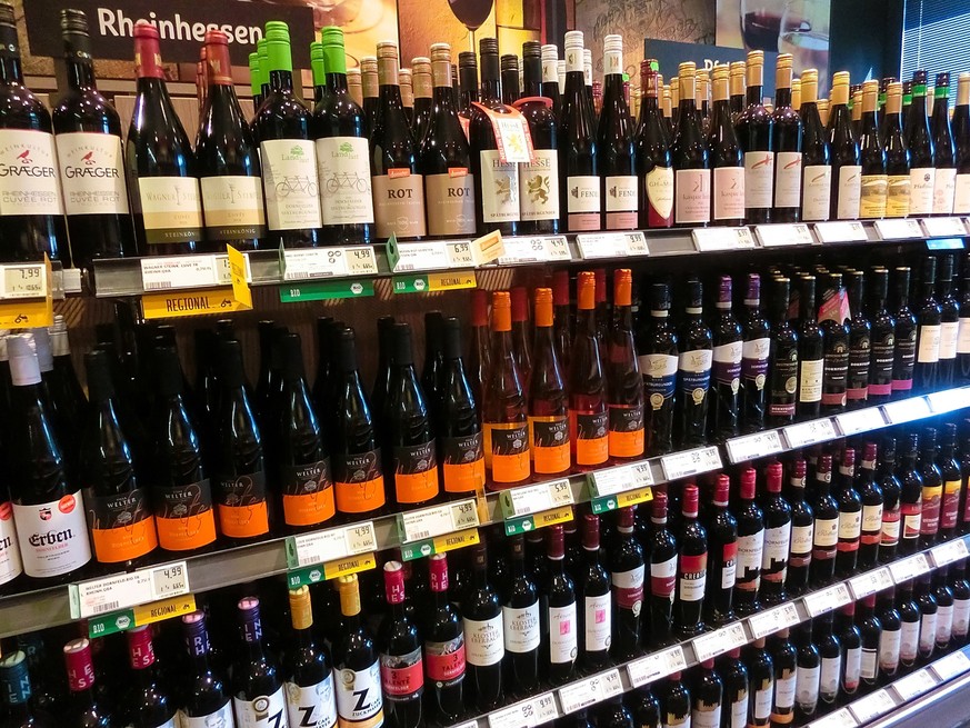 REWE market wines in Frankfurt am Main, Germany, Frankfurt am Main, Germany - April 20, 2022: Assortment wines from different origins in a REWE supermarket., Frankfurt am Main, Germany - April 20, 202 ...