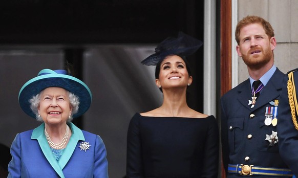 Lilibet &quot;Lili&quot; Diana Mountbatten-Windsor birth. File photo dated 10/7/2018 of Queen Elizabeth II with the Duke and Duchess of Sussex on the balcony at Buckingham, Palace where they watched a ...