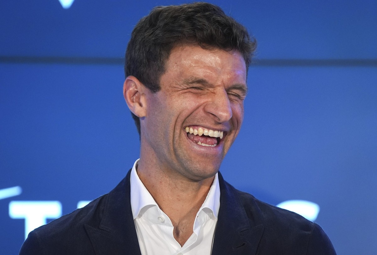 New Vancouver Whitecaps player Thomas Muller, of Germany, laughs during an MLS soccer news conference, Thursday, Aug. 14, 2025, in Vancouver, British Columbia. (Darryl Dyck/The Canadian Press via AP)