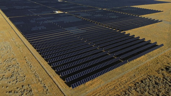 FILE - A solar farm sits in Mona, Utah, on Tuesday, Aug. 9, 2022. The Biden administration is announcing Thursday, April 20, 2023, more than $80 million in funding as part of a push to make more solar ...