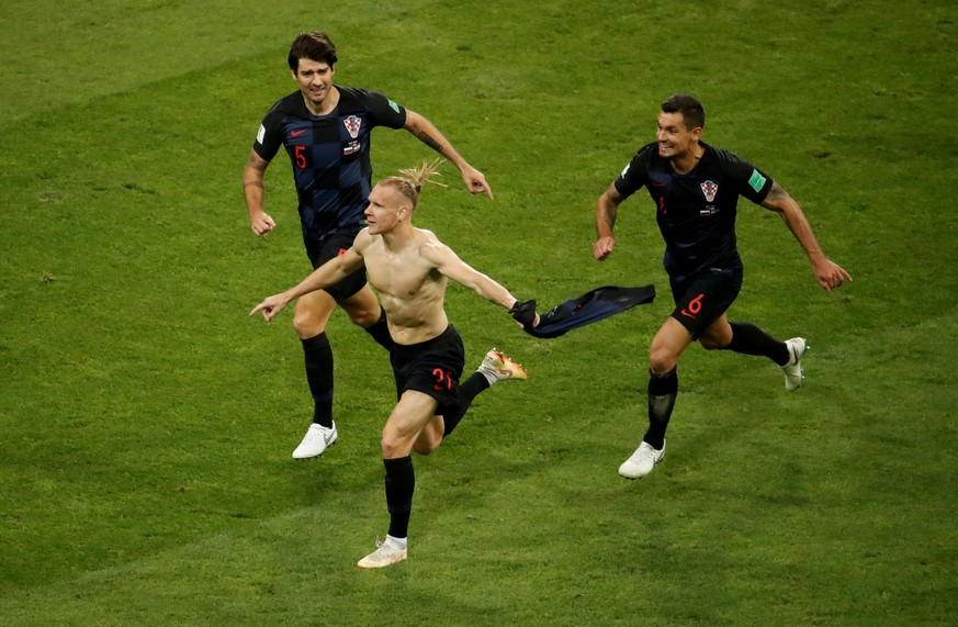 FILE PHOTO: Soccer Football - World Cup - Quarter Final - Russia vs Croatia - Fisht Stadium, Sochi, Russia - July 7, 2018 Croatia&#039;s Domagoj Vida celebrates their second goal with Vedran Corluka a ...