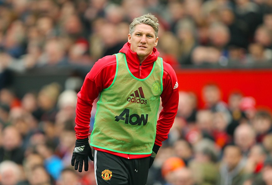 Manchester United v Reading - Emirates FA Cup - Third Round - Old Trafford. Manchester United's Bastian Schweinsteiger warms up on the touchline URN:29708708