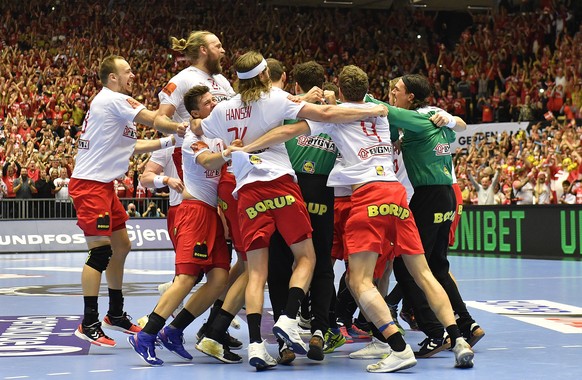 Denmark players celebrate after winning the Handball World Championship final match between Denmark and Norway in Herning, Denmark, Sunday, Jan. 27, 2019. (AP Photo/Martin Meissner)