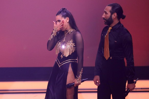 COLOGNE, GERMANY - APRIL 29: Amira Pocher and Massimo Sinató speak on stage during the 9th show of the 15th season of the television competition show &quot;Let&#039;s Dance&quot; at MMC Studios on Apr ...