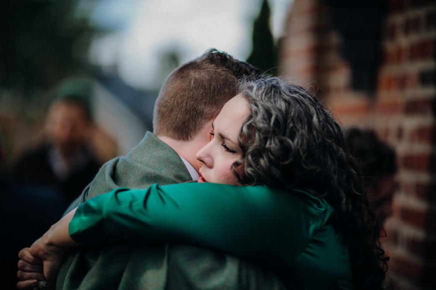 Couple hugging sad