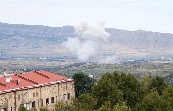 Azerbaijan Armenia Conflict 8520438 19.09.2023 Smoke rises after shelling on the outskirts of Stepanakert, the capital of the breakaway Nagorno-Karabakh region, Azerbaijan. Azerbaijani Defence Ministr ...