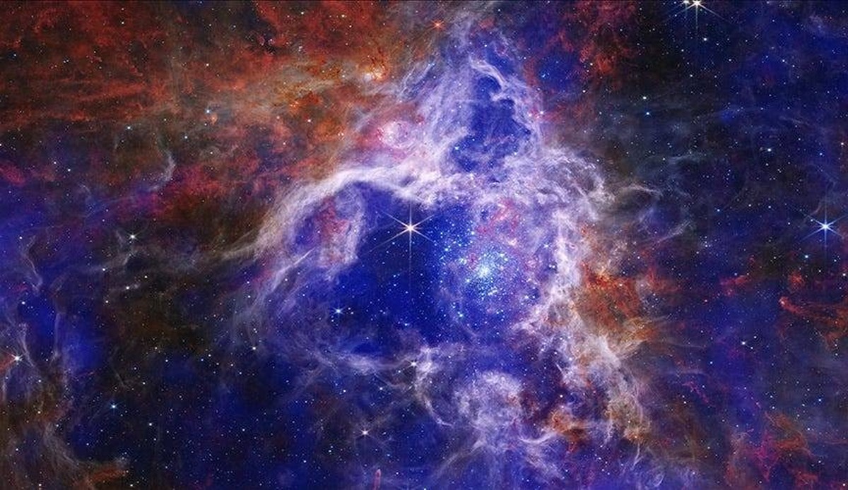 Syndication: USA TODAY 30 Doradus, also known as the Tarantula Nebula, is a region of active star formation located in the Large Magellanic Cloud, a neighbor galaxy of the Milky Way. This new composit ...