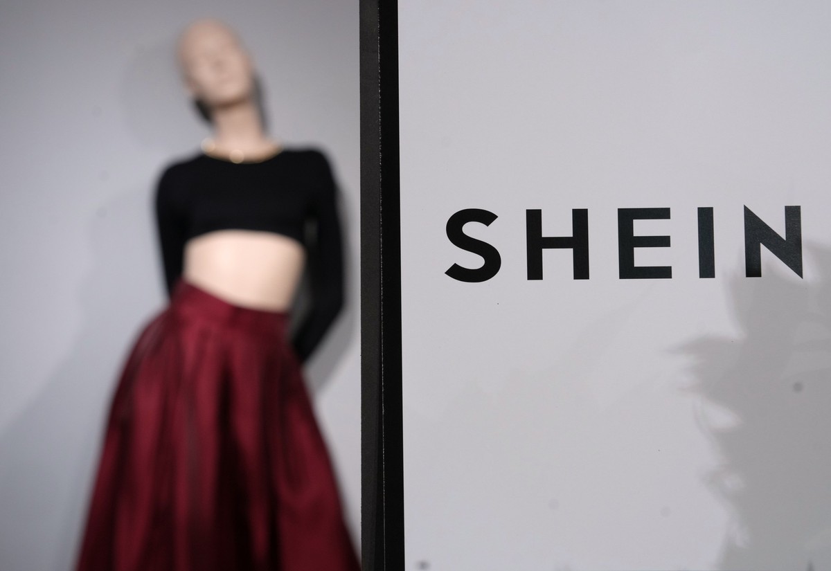 Clothes by Chinese company Shein are seen in the BHV (Bazar de l&#039;Hotel de Ville) general store, ahead of the Shein stand opening, Tuesday, Nov. 4, 2025 in Paris. (AP Photo/Aurelien Morissard)